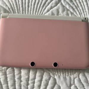 Nintendo 3DS XL (pink) with 11 games and charger